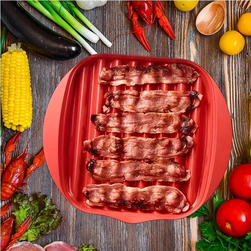 A red silicone tray holds sliced bacon strips ready for cooking on a wooden surface.