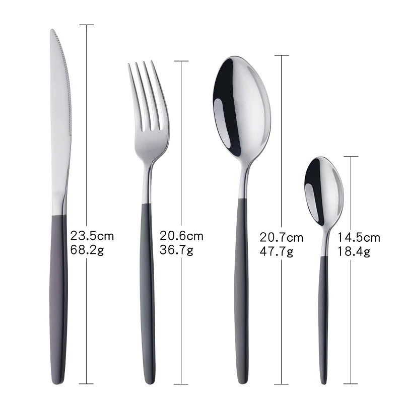 A set of elegant stainless steel flatware including a knife, fork, and spoon.