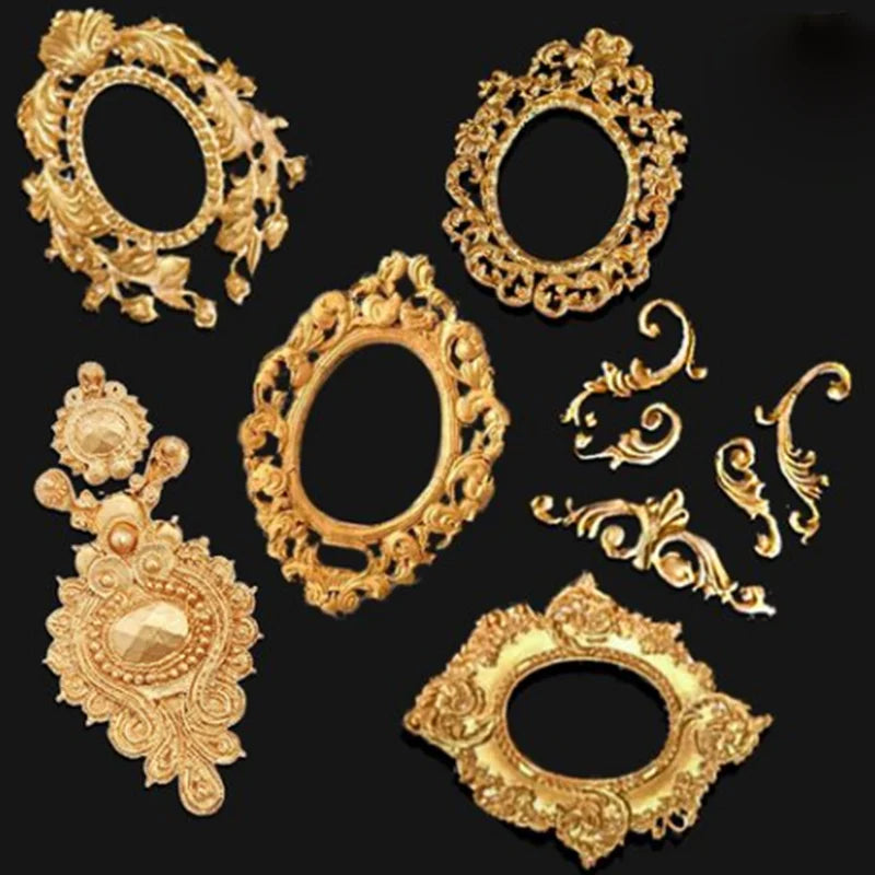 A set of gold silicone fondant cake decorating molds featuring various ornate, decorative shapes.