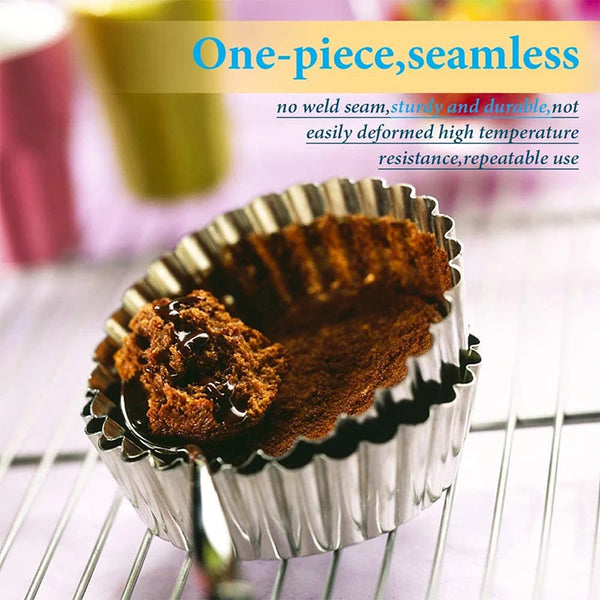 A reusable stainless steel egg tart muffin mold filled with dark brown baked goods.