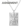 A silver stainless steel necklace featuring a tarot card design for judgement