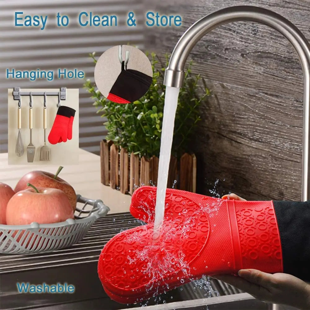 A hand is washing a red silicone oven mitt under a faucet, demonstrating its washable and easy-to-clean features.