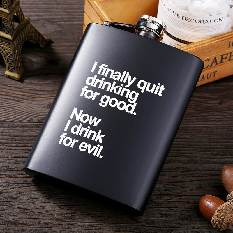 A black laser engraved stainless steel hip flask with text reading I finally quit drinking for good. Now I drink for evil.