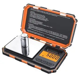 A digital precision kitchen scale with an orange and black casing and a clear display.