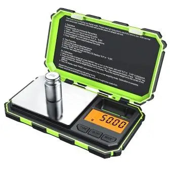 A digital precision kitchen scale with a green and black case displaying a measurement.