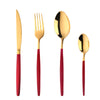 A set of elegant stainless steel flatware including a knife, fork, and spoon with red handles.
