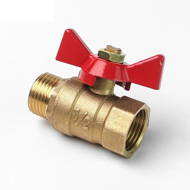 A brass two-way ball valve with a red handle and threaded connection for fluid control.