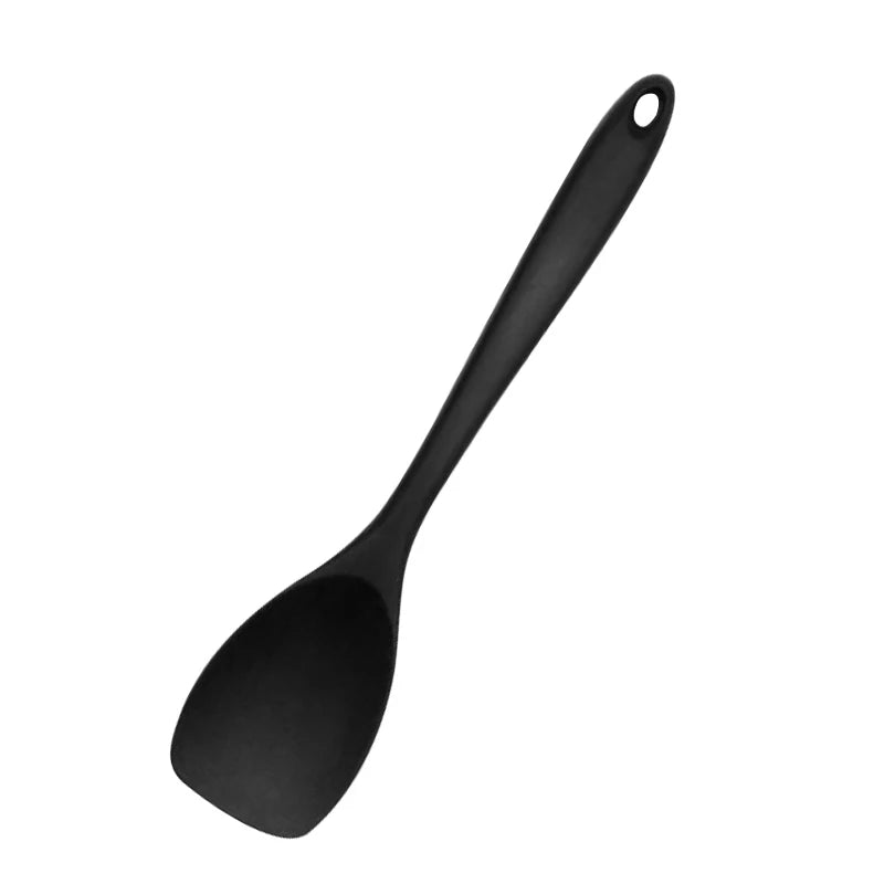 A black food grade silicone cooking spatula is shown against a white background.