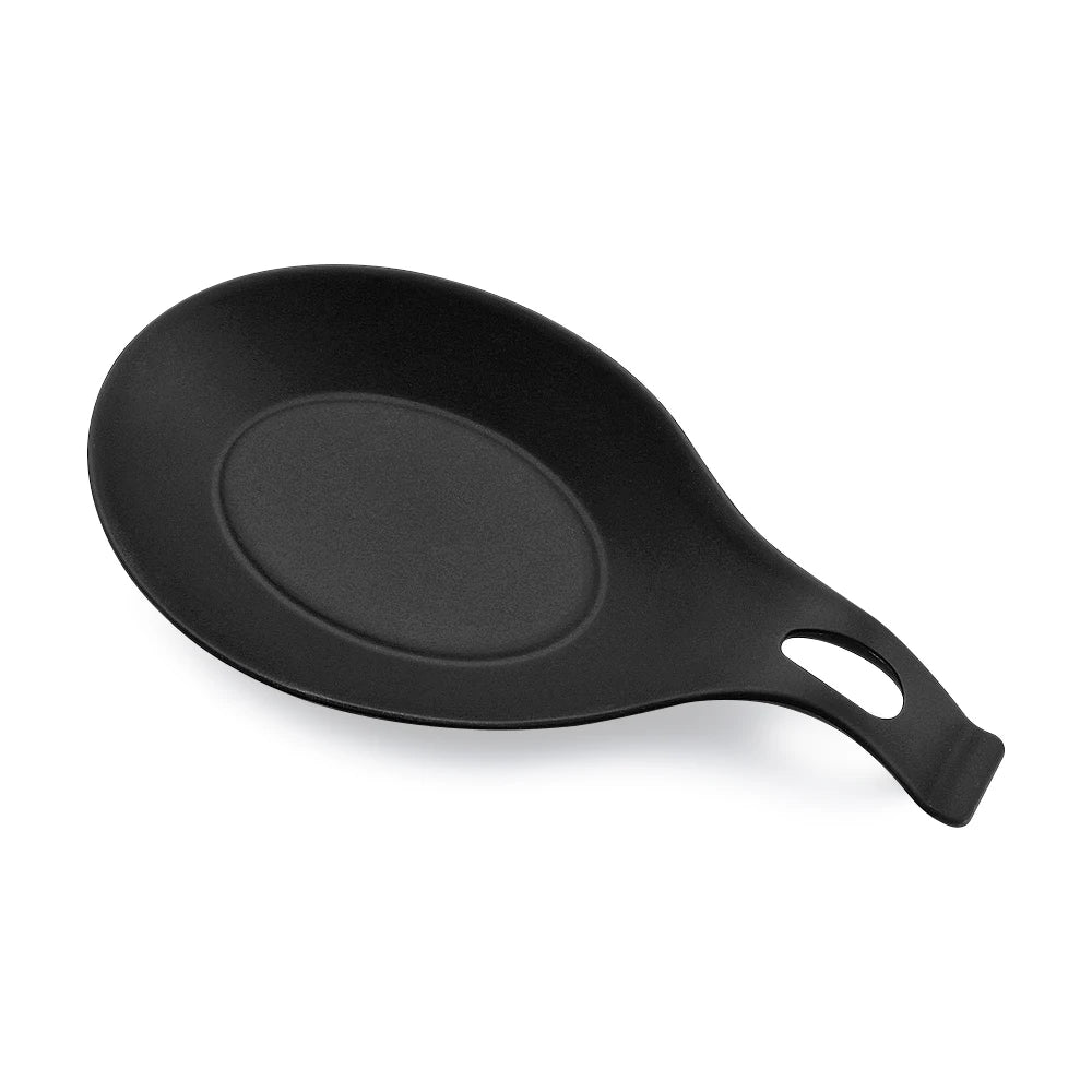 A black silicone utensil holder and kitchen organizer with a curved handle.