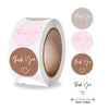 Roll of pink thank you adhesive stickers for crafting with individual thank you messages