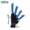 A black ceramic multi-use kitchen knife set with blue handles displayed on a white background.