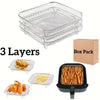 A stack of three stainless steel grill racks, including a box pack and individual trays for frying food.