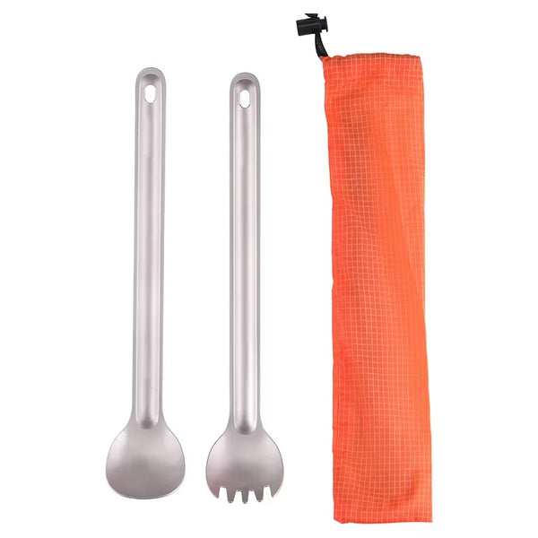 A titanium long-handled spork cutlery set with an orange fabric pouch.