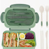 A light green bento box set featuring a main compartment for food and an attached cutlery set.