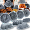 A collection of gray silicone baking molds for cakes and muffins, shown in various shapes and angles.