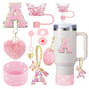 A pink tumbler accessory kit featuring a silicone boot, straw covers, and charm for personalization.