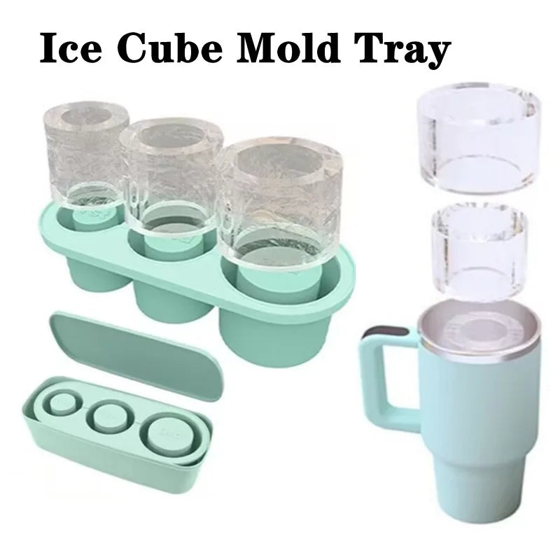 A set of silicone ice cube molds and a tumbler accessory tray in mint green.