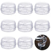 A set of clear plastic stove knob covers for child safety.