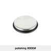 A round, white polishing pad or disc used for sharpening.