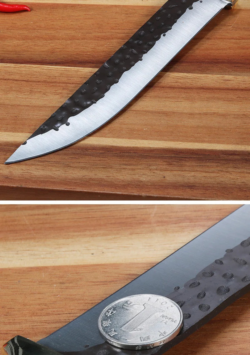 A close-up view of a stainless steel knife blade and a coin resting on a wooden cutting board.