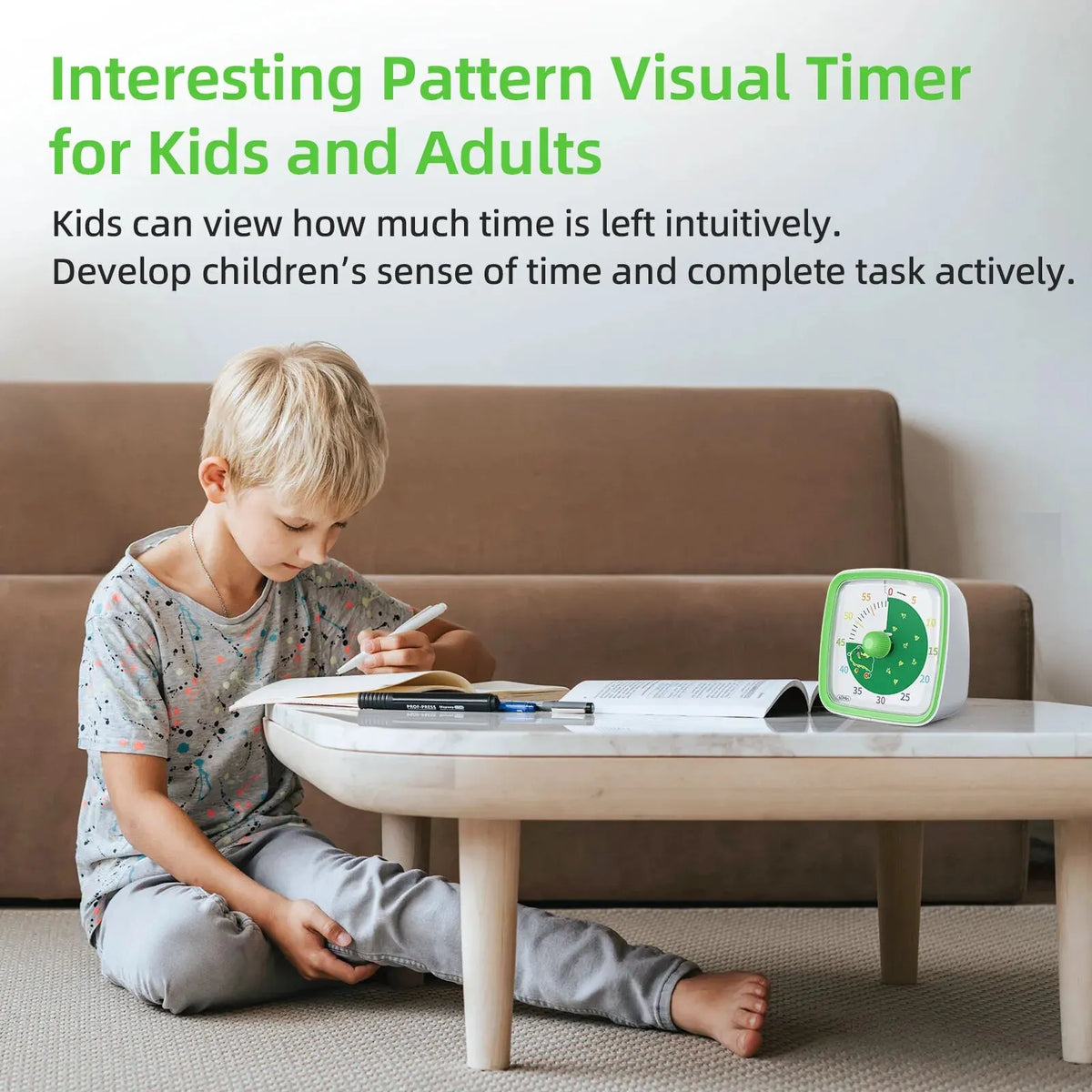 A young boy is using an interesting pattern visual timer for kids and adults on a table.