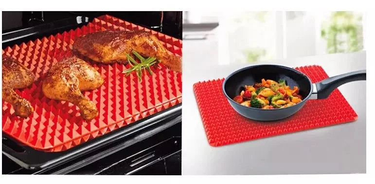 A silicone BBQ pizza mat is shown with roasted chicken pieces on a baking tray and a small skillet of food on a red mat.