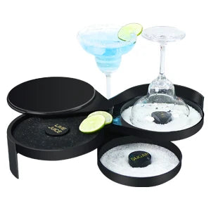 A set of three bar glasses and a citrus juicer for preparing cocktails.