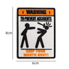 An orange and black warning patch with text to prevent accidents and a graphic showing a person keeping their mouth shut.