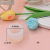 A silicone flower candle mold showing a yellow tulip and a blue rose, with dimension markings.