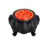 A black cauldron ornament with a red, textured lid resembling a witch's cauldron.
