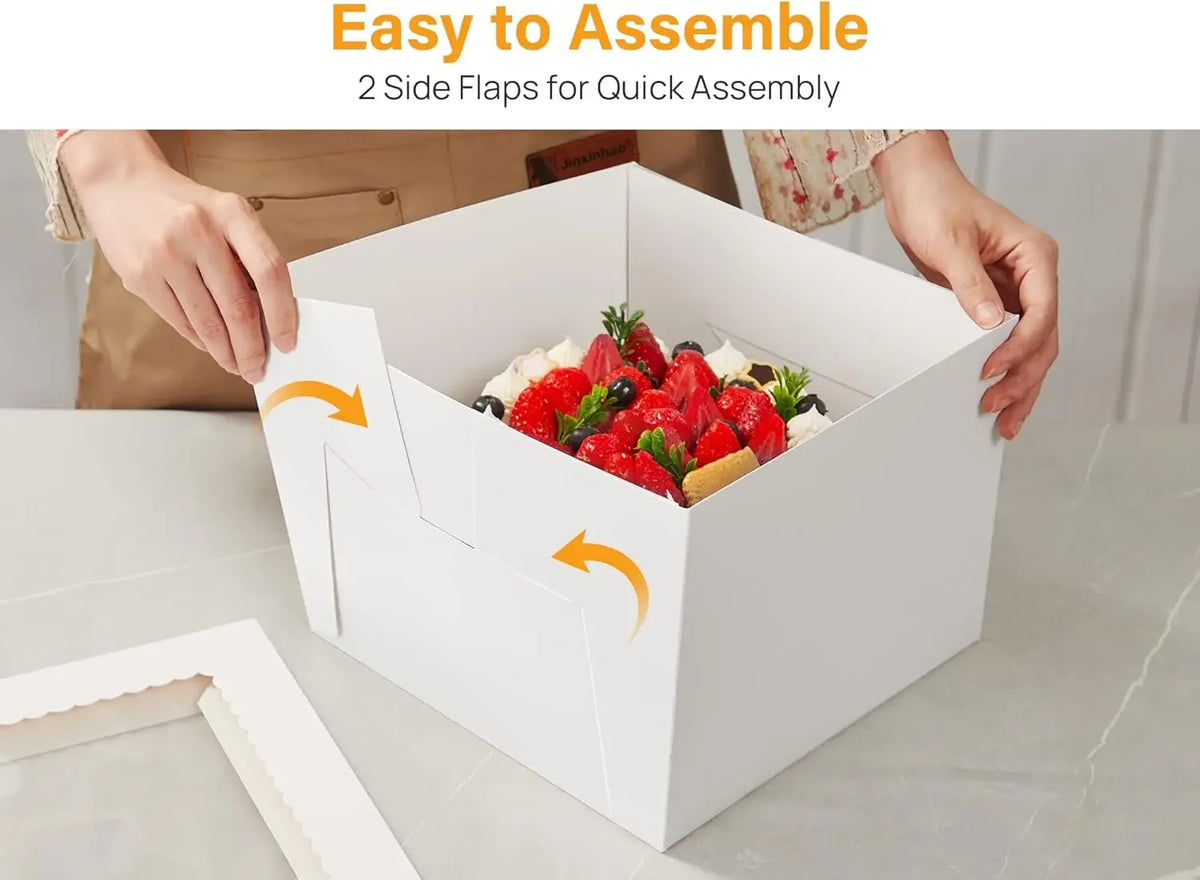 Hands assembling a white square window cake box with two side flaps for quick assembly
