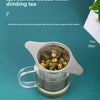 A stainless steel tea filter funnel with a lid is shown, designed to allow tea to be brewed without spitting residue.