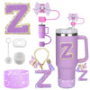 A set of purple glitter silicone straw toppers and accessories for tumblers, including a large tumbler.