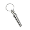 A silver metal bottle opener keychain with a circular ring and a cylindrical handle.