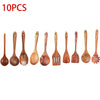 A set of 10 natural teak wooden cooking spoons and utensils arranged in a row.