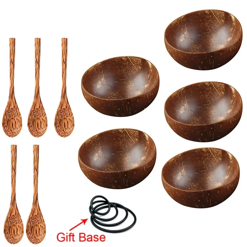 A set of natural brown coconut shell serving bowls and wooden spoons displayed on a white background.