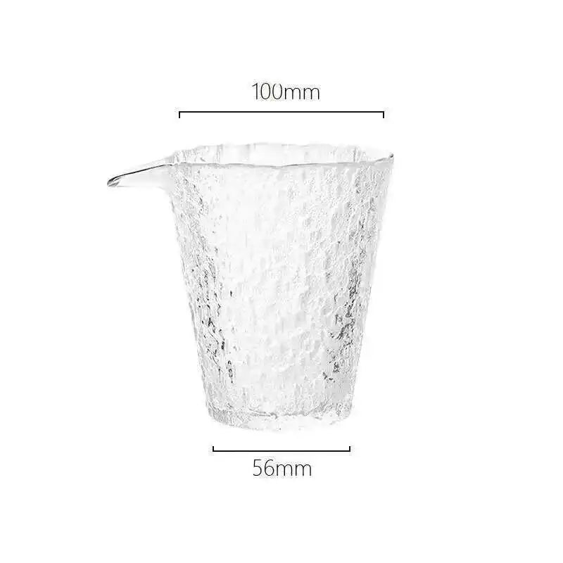 A clear, textured glass cup or bowl used for tea ceremony.