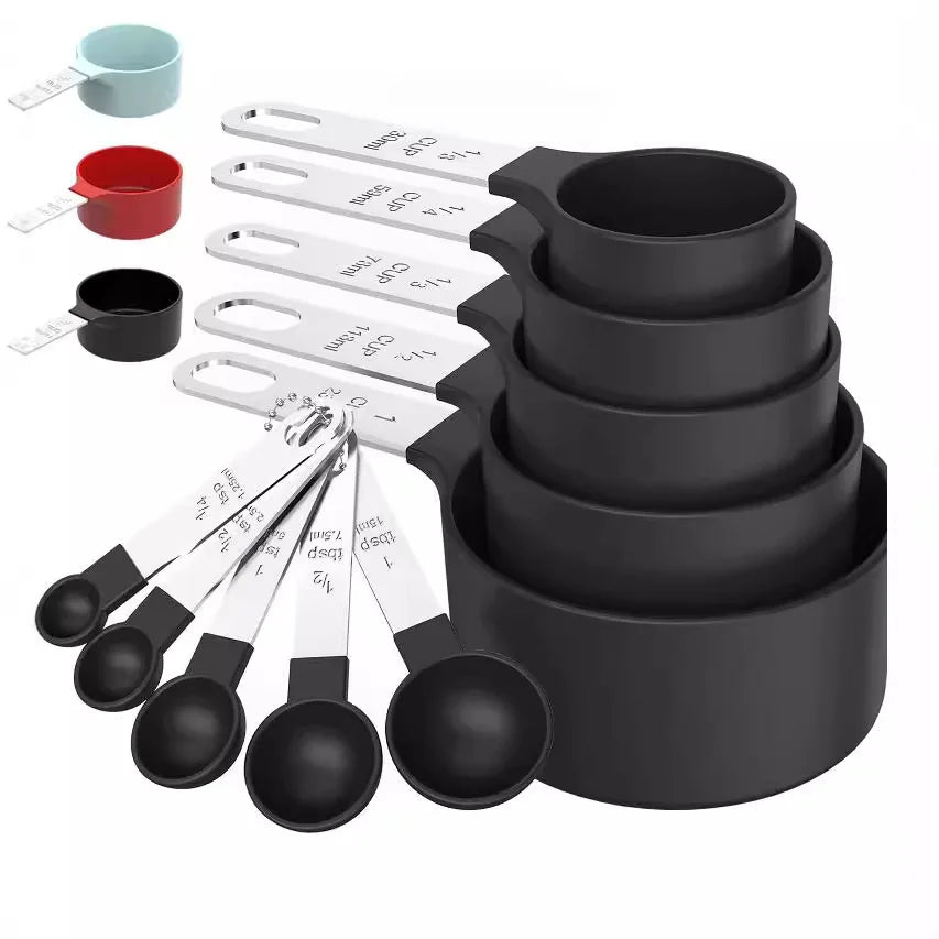 A set of ten stainless steel measuring spoons and cups for kitchen use.