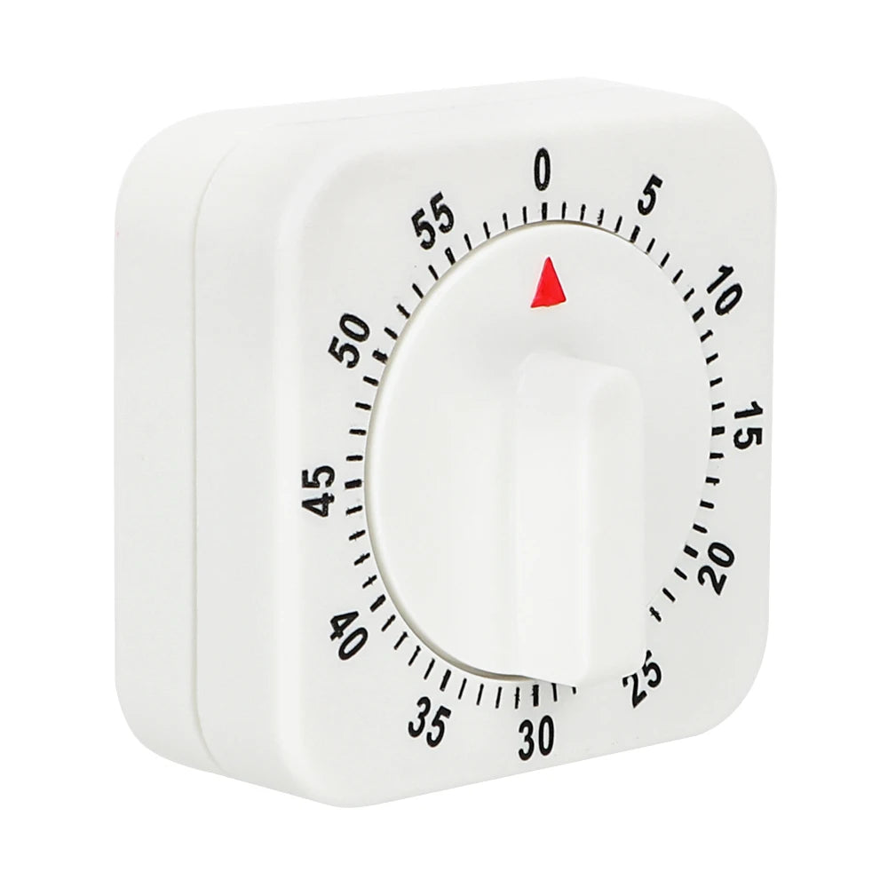 A white square mechanical kitchen timer with a red indicator needle showing the time setting.