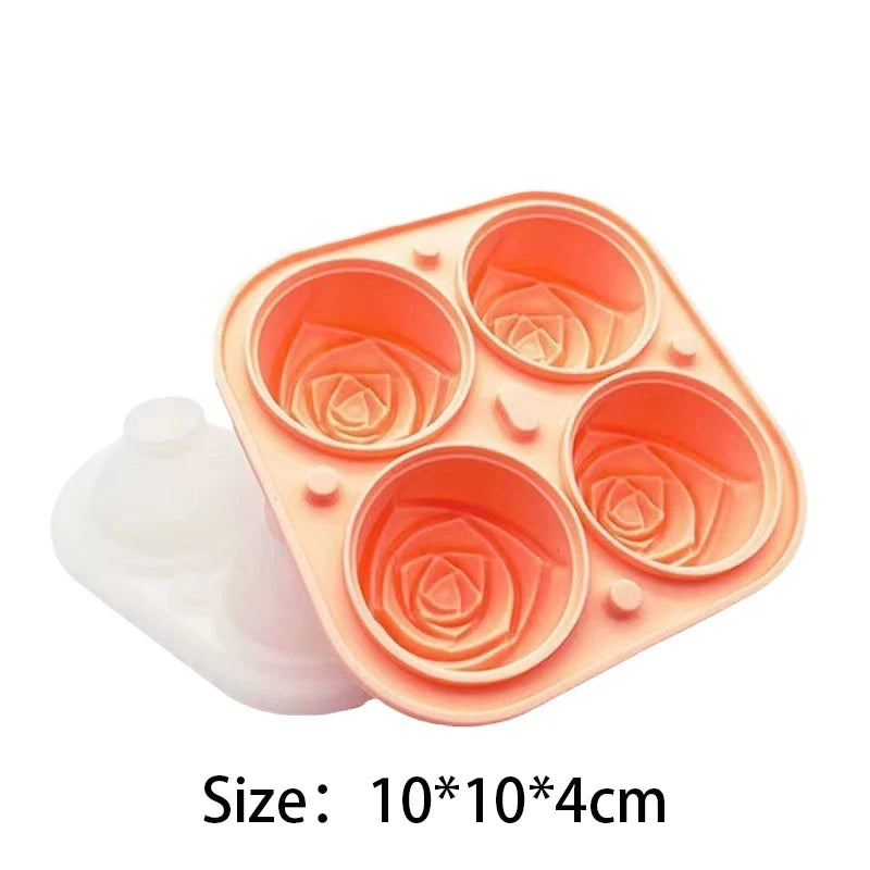 A pink silicone mold tray with four rose-shaped cavities for making ice cubes or crafts.