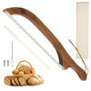 A wooden bread bow cutter with a serrated blade is shown next to various homemade breads and a parchment paper roll.