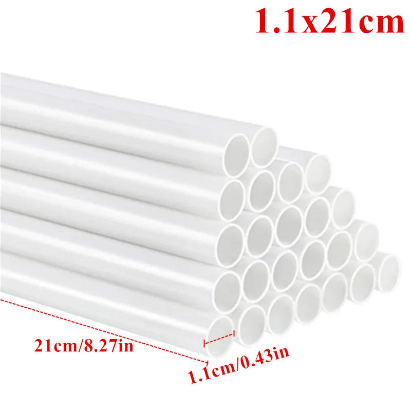 White plastic cake dowels in a cylindrical form, showing dimensions of 1.1x21cm.