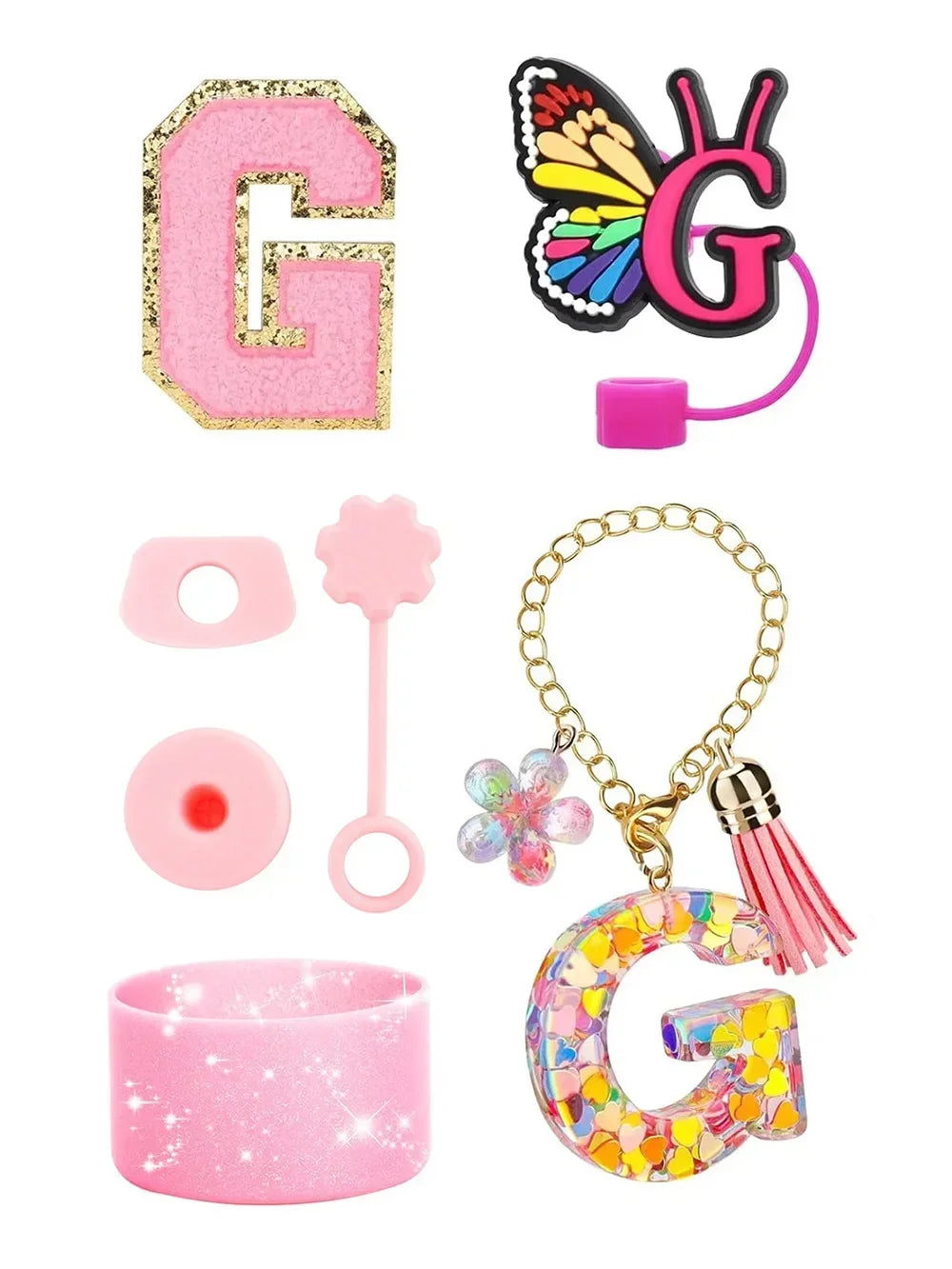 A set of silicone straw covers and a pink tumbler accessory featuring a glittery letter G