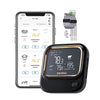 A black Inkbird meat thermometer is shown next to a smartphone displaying temperature readings and settings.
