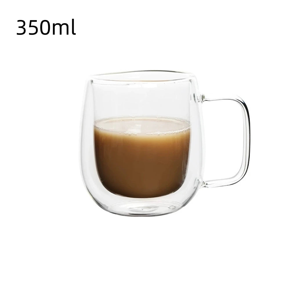 A clear double wall insulated glass coffee cup filled with brown liquid, shown from the side.