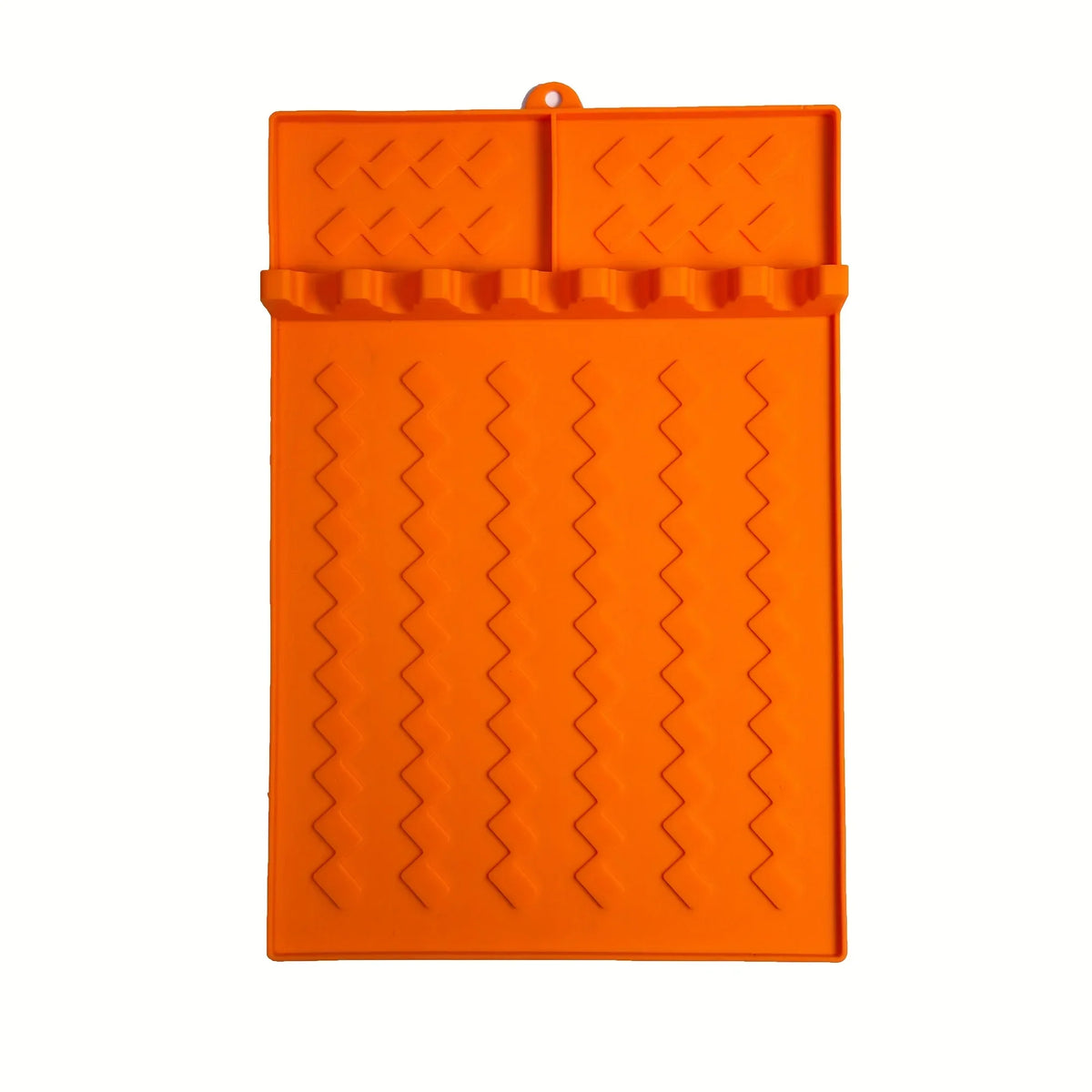 Orange silicone side burner rack and utensil storage mat with textured surfaces