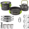A camping cookware set featuring a pot, a frying pan, and various stainless steel utensils.
