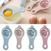 A set of multi-piece silicone egg white and yolk separators in various pastel colors.
