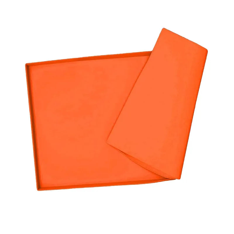 Orange silicone BBQ baking mat shown flat and folded