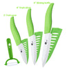A set of five green and white ceramic slicing knives, including a 5 inch slicing knife, 4 inch fruit slicer, and 3 inch fruit